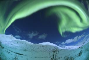 Puente de diciembre en Tromso: Auroras boreales en la Laponia noruega